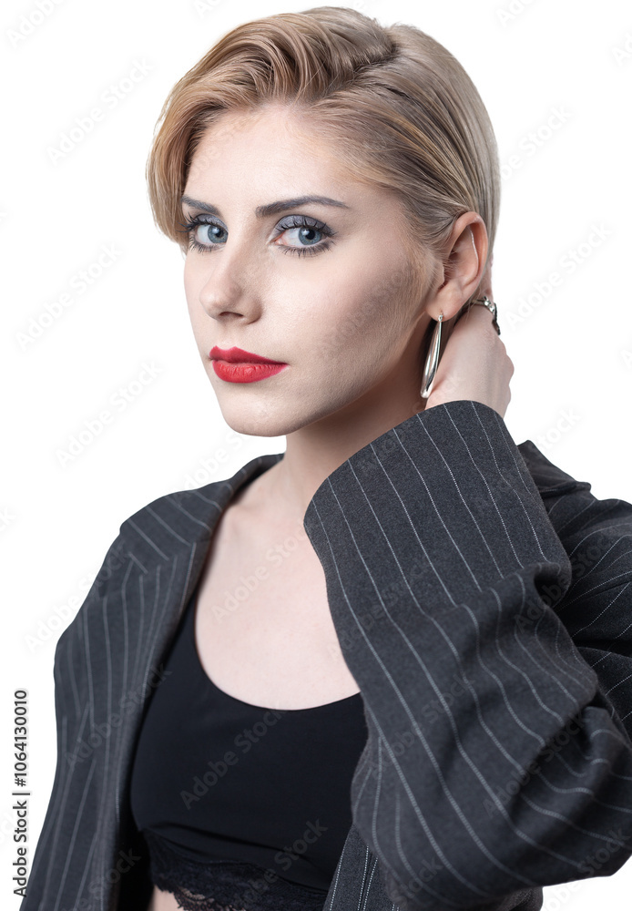 Portrait of a seductive, stylish business lady in the studio. Blonde girl in a suit and top. Portrait of a seductive, stylish business lady in the studio. Blonde girl in a suit and top.
