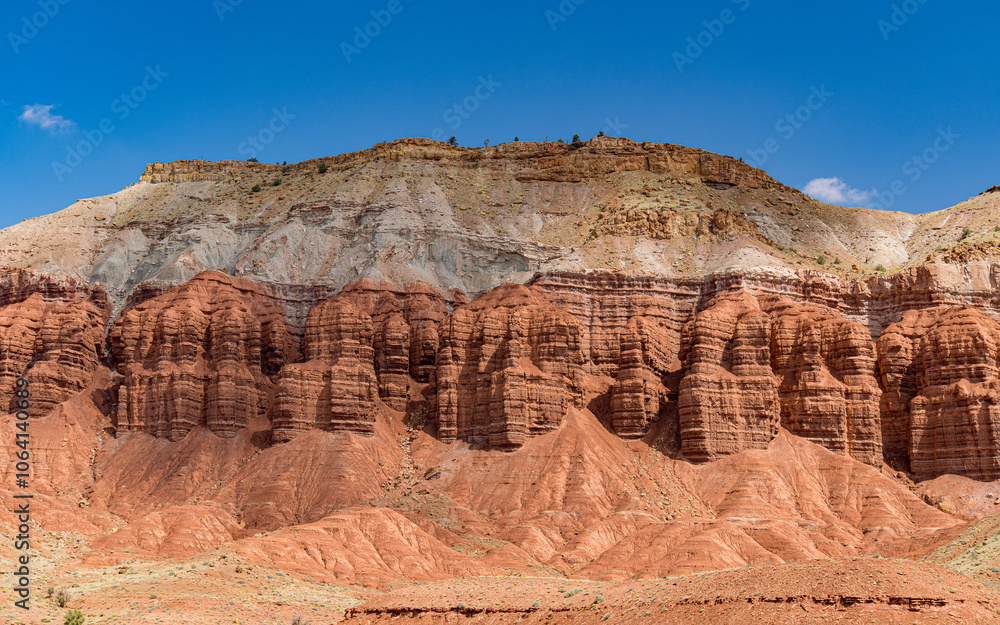 The Fluted Wall, a sandstone layering feature seen from Panorama Point in Capitol Reef National Park, southern Utah The Fluted Wall, a sandstone layering feature seen from Panorama Point in Capitol Reef National Park, southern Utah
