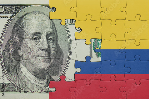 Wallpaper Mural puzzle with the national flag of colombia and the usa dollar money .finance concept Torontodigital.ca
