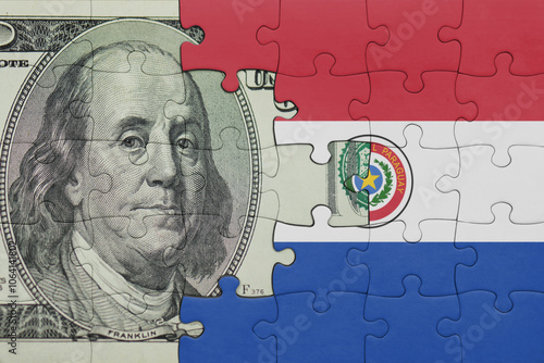 Wallpaper Mural puzzle with the national flag of paraguay and the usa dollar money .finance concept Torontodigital.ca