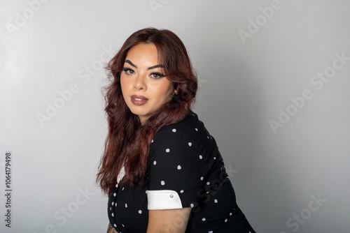 Woman in Polka Dot Black Dress