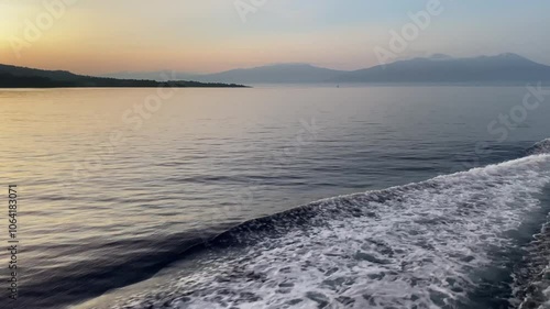 View of the island from the sea in the morning. the natural beauty of the sunrise. Manado Islands, Indonesia - October 30th 2024