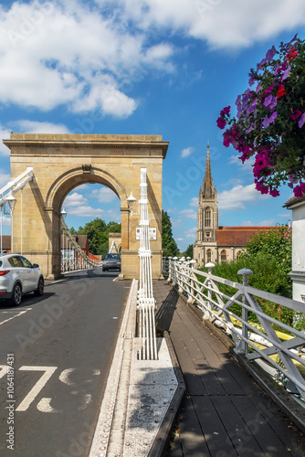 Marlow suspension bridge and All Saints Church, Buckinghamshire, England photo