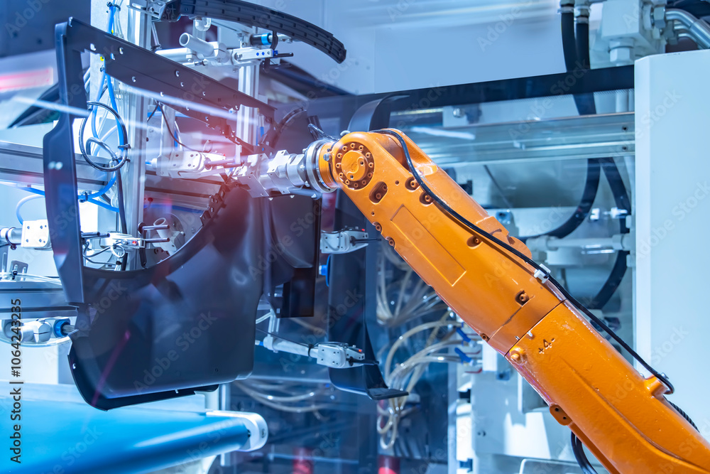 industrial machine and factory robot arm with part of car,Smart factory industry 4.0 concept. industrial machine and factory robot arm with part of car,Smart factory industry 4.0 concept.