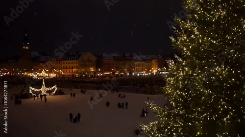 Christmas Town Celebration with Glowing Lights at Night
 photo