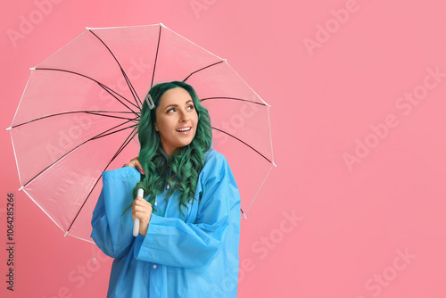 Beautiful woman in raincoat...