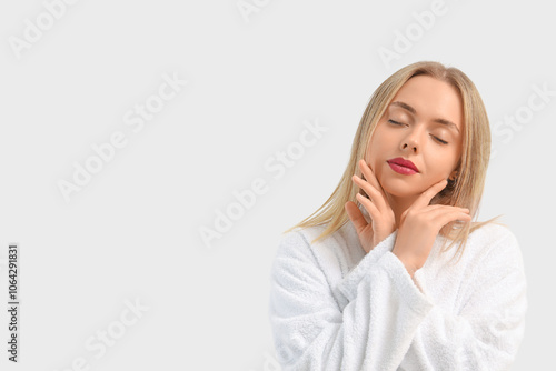 Pretty young woman in bathr...