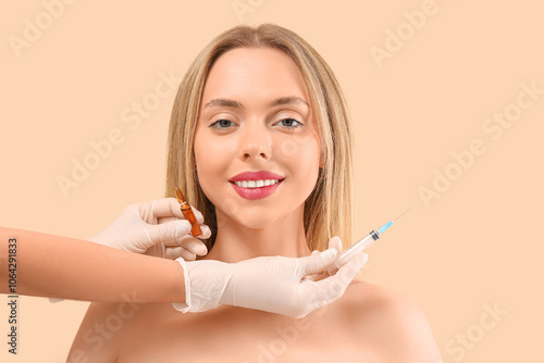 Young woman receiving fille...