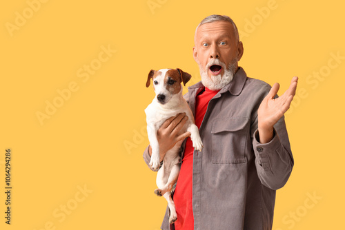 Surprised senior man with c...