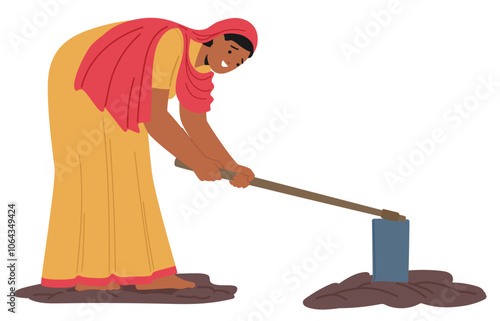 Indian Woman In Traditional Attire Bends Down To Till The Soil With A Hand Tool, Symbolizing Hard Work, Rural Life