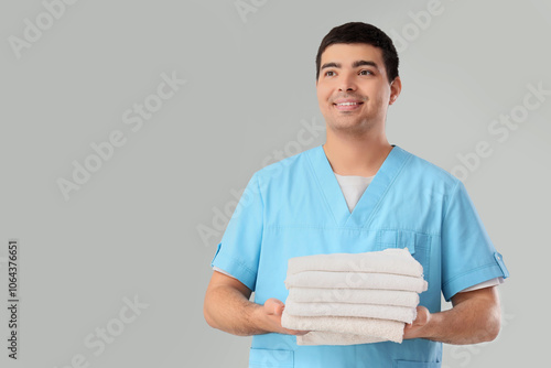 Male massage therapist with...