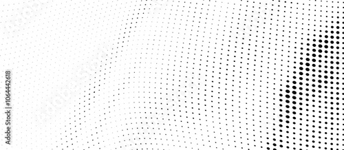 Black and white halftone texture. Waves of black dots on a white background