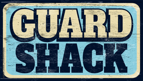 Aged retro guard shack sign on wood