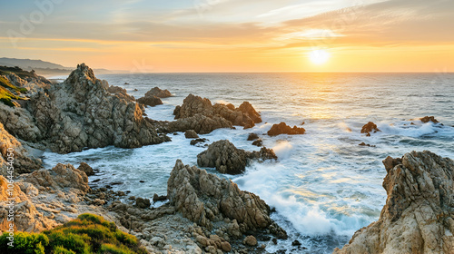 Rocky coastline with crashing waves at sunset.