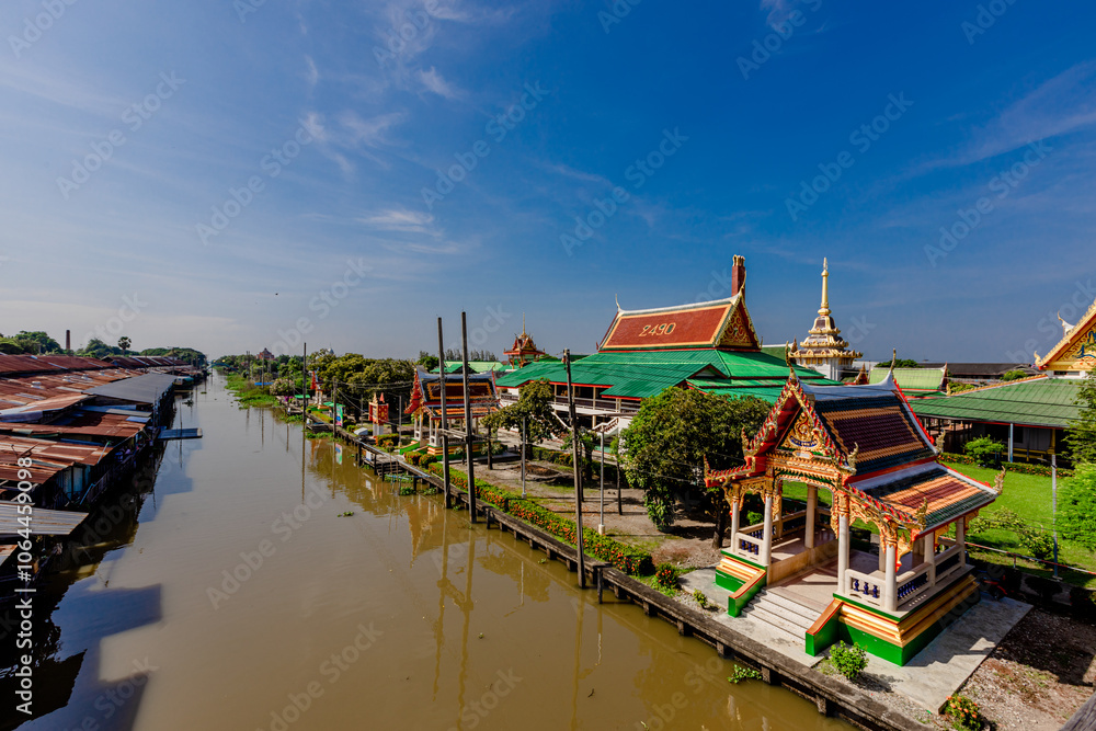 Background of high angle view from wooden bridge in community market area crossing canal at tourist attraction, community lifestyle of people living together in a mutually beneficial way. Background of high angle view from wooden bridge in community market area crossing canal at tourist attraction, community lifestyle of people living together in a mutually beneficial way.