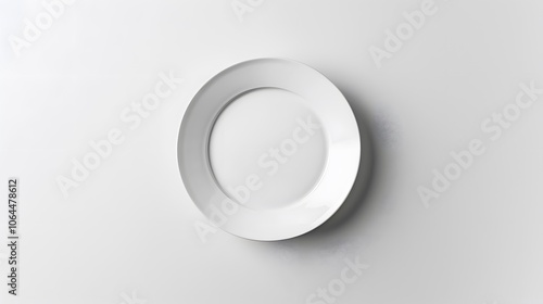 Empty white ceramic round plate isolated on white background. 