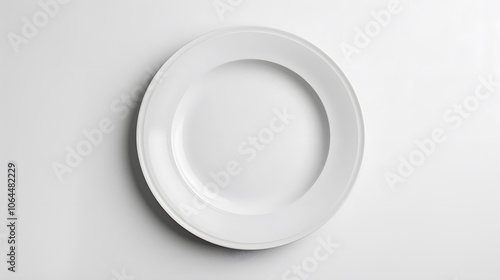 Empty white ceramic round plate isolated on white background. 