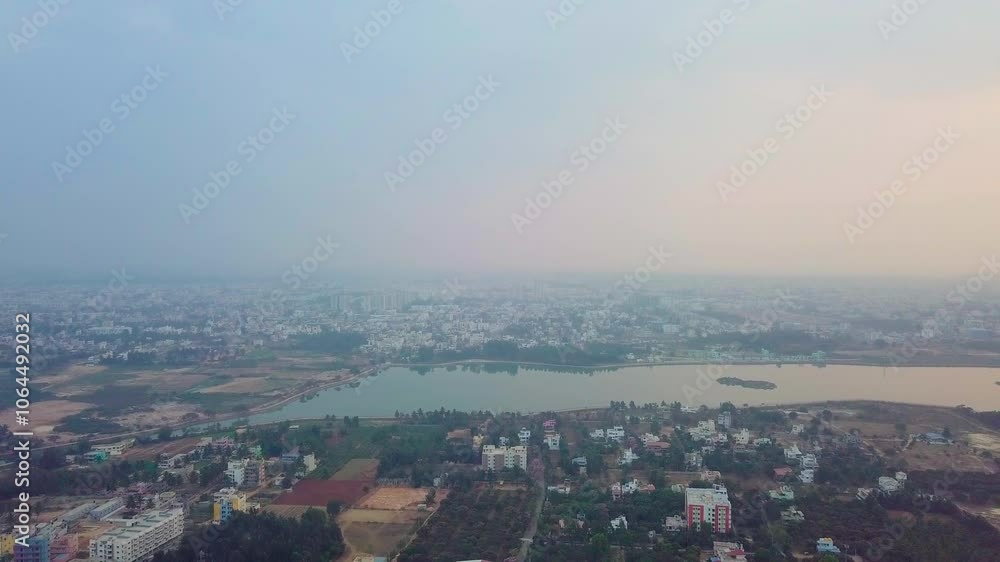 Drone shot of cityscape of Bangalore with Kalkere Lake in Karnataka. Drone shot of cityscape of Bangalore with Kalkere Lake in Karnataka.