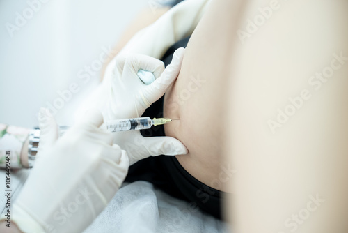 Cellulite Treatment, correction body fat with lipolytics. Doctor injections on thigh.