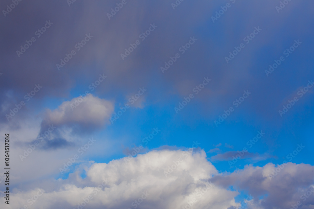 White heap clouds in the blue peaceful sky. The concept of psychological calmness and health. Peace of mind with the forces of nature. Air travel concept. White heap clouds in the blue peaceful sky. The concept of psychological calmness and health. Peace of mind with the forces of nature. Air travel concept.