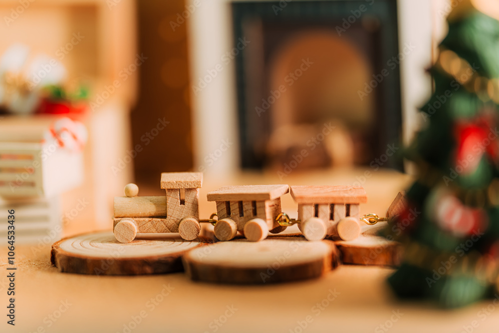 Cozy Christmas Scene with Wooden Miniature Train and Fireplace Cozy Christmas Scene with Wooden Miniature Train and Fireplace