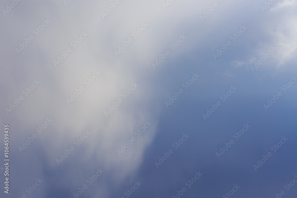 White heap clouds in the blue peaceful sky. The concept of psychological calmness and health. Peace of mind with the forces of nature. Air travel concept.