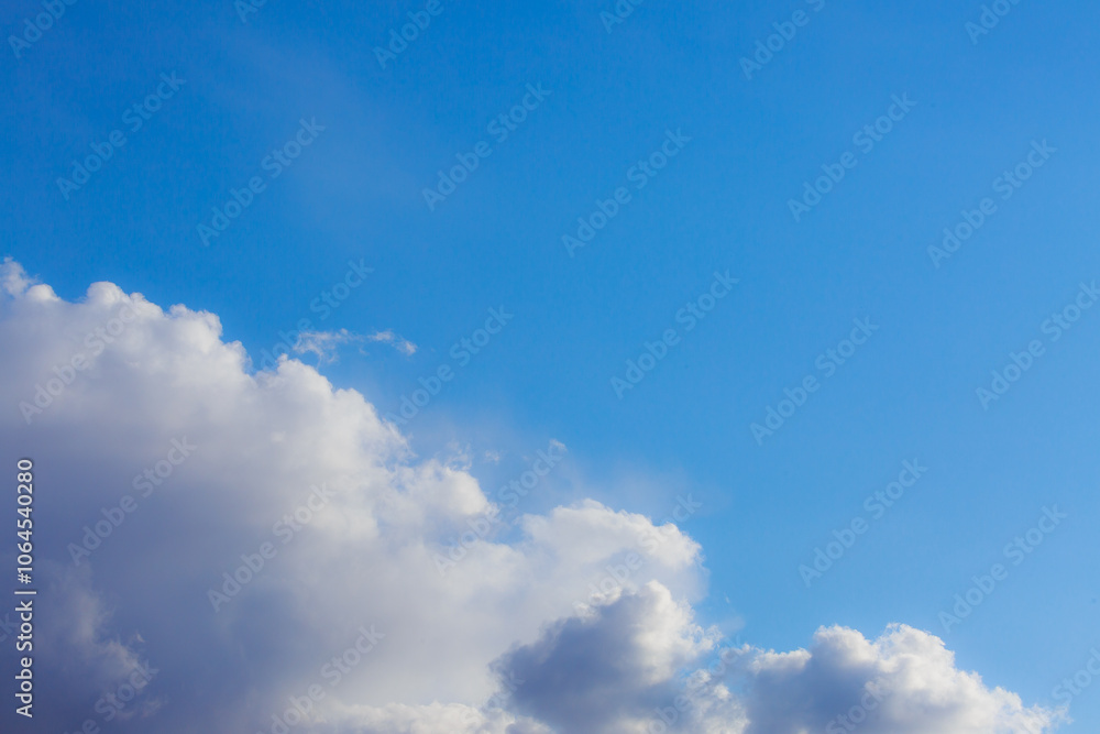 White heap clouds in the blue peaceful sky. The concept of psychological calmness and health. Peace of mind with the forces of nature. Air travel concept. White heap clouds in the blue peaceful sky. The concept of psychological calmness and health. Peace of mind with the forces of nature. Air travel concept.