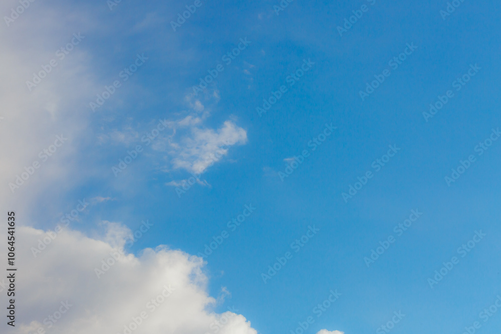 White heap clouds in the blue peaceful sky. The concept of psychological calmness and health. Peace of mind with the forces of nature. Air travel concept. White heap clouds in the blue peaceful sky. The concept of psychological calmness and health. Peace of mind with the forces of nature. Air travel concept.