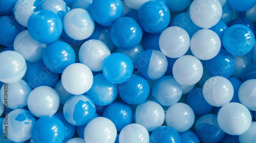 White and blue plastic balls selected for a ball pit