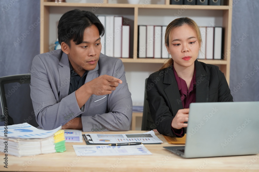 Financial Analysis: Business team working in office with tablets and documents to plan and analyze financial reports discussing investments according to business plan. Financial Analysis: Business team working in office with tablets and documents to plan and analyze financial reports discussing investments according to business plan.