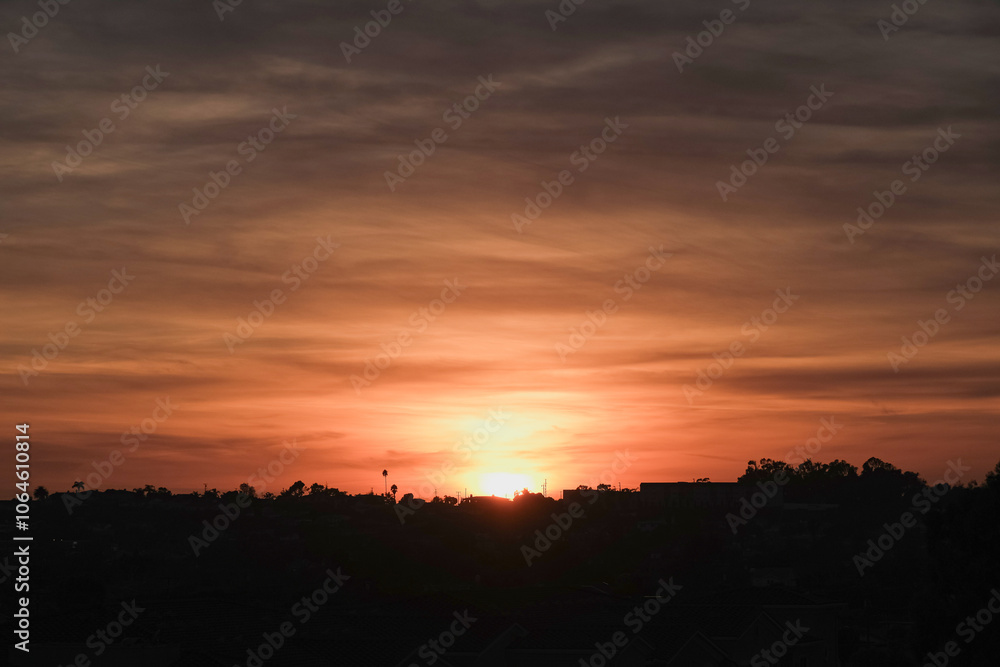 Panoramic sunrise or sunset dusk dawn landscape nature coastal scenery with beautiful fire sky and dramatic cloudscapes over California coast range view near Los Angeles Panoramic sunrise or sunset dusk dawn landscape nature coastal scenery with beautiful fire sky and dramatic cloudscapes over California coast range view near Los Angeles