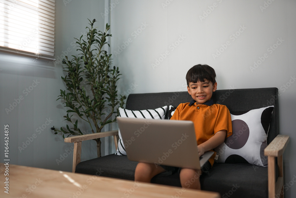 Smart child spending time online at home
Smart child spending time online at home