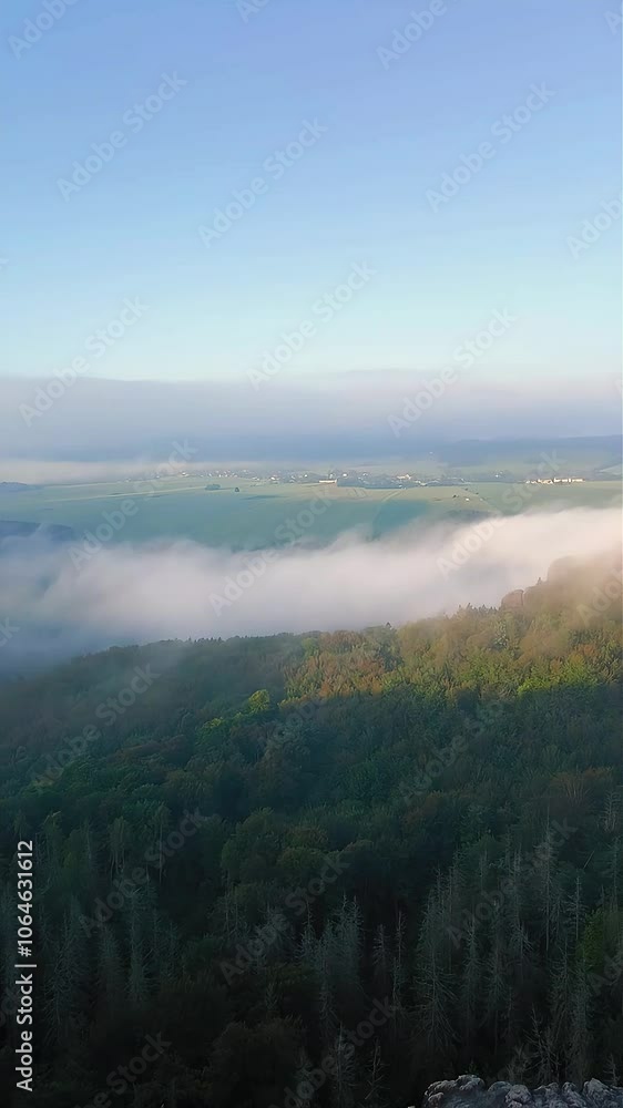 An early morning in mountain. Schrammsteine - group of rocks are a long, strung-out, very jagged in the Elbe Sandstone Mountains located in Saxon Switzerland in East Germany. An early morning in mountain. Schrammsteine - group of rocks are a long, strung-out, very jagged in the Elbe Sandstone Mountains located in Saxon Switzerland in East Germany.