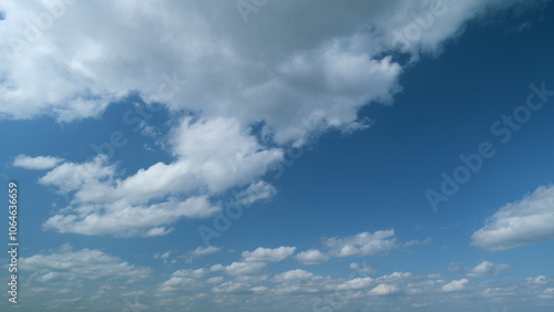 Clear cloudscape background. cumulus and stratocumulus clouds in sky, beautiful summer. Timelapse.