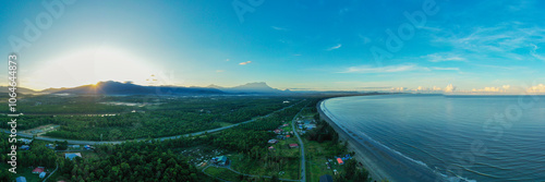 River flowing through tropical rainforest towards mount kinabalu in borneo malaysia