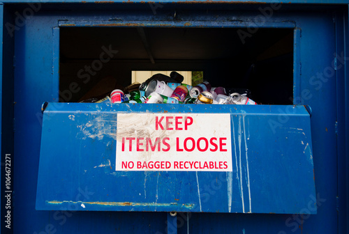 Close up of a recycling container for tin cans photo