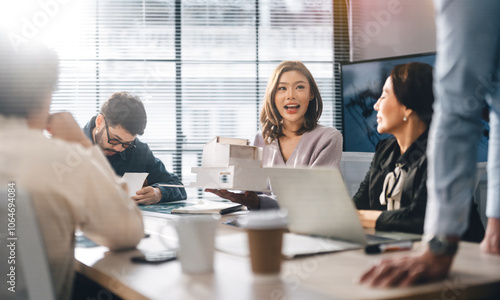 Asian business teamwork in a modern office planning and presenting ESG and technology innovations