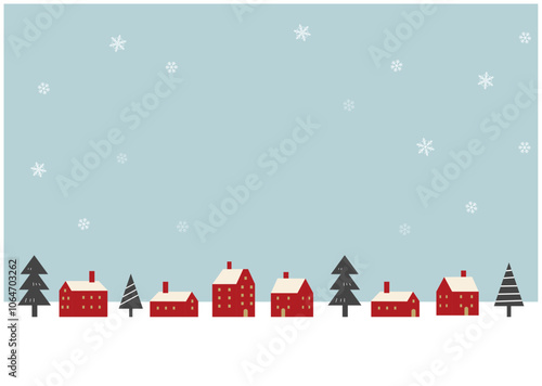 雪の降るクリスマスの街並み