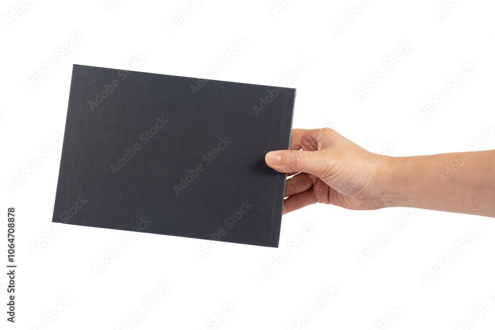 Blank black book cover in hand on transparent background. Blank black book cover in hand on transparent background.