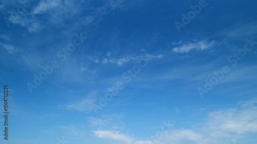 Blue sky with cirrus clouds and sun. Beautiful sky with clouds background. Timelapse.