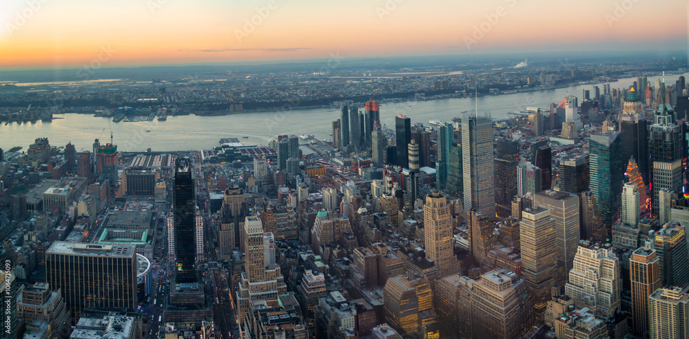 Fototapeta premium Manhattan skyscrapers high rise buildings in Midtown Manhattan and the East River, aerial view in New York City and Hudson river