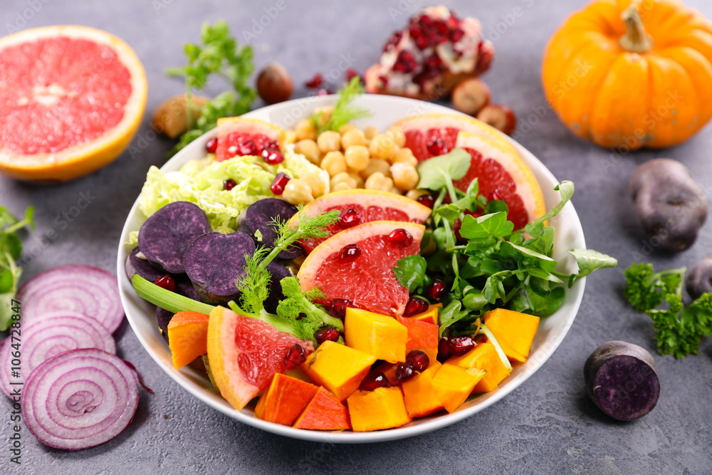 mixed vegetarian salad with grapefruit, avocado, pumpkin, pomegranate and onion- healthy eating mixed vegetarian salad with grapefruit, avocado, pumpkin, pomegranate and onion- healthy eating