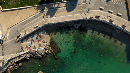 Fotografie Aerial view of Cala Porta Vecchia beach located in Monopoli, in the province of Bari, Apulia, Italy