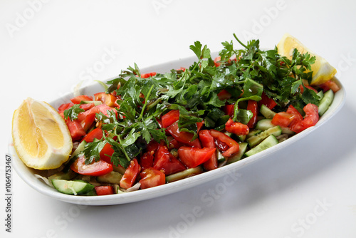 Turkish kebab salad mixed salad plate. onion, tomato, pepper, parsley and spices