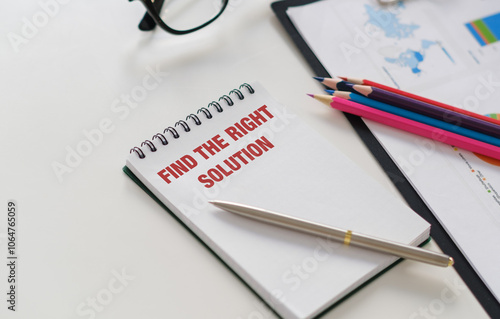 Wallpaper Mural A notebook with the words Find the Right Solution written on it. A pen is sitting on top of the notebook. Torontodigital.ca