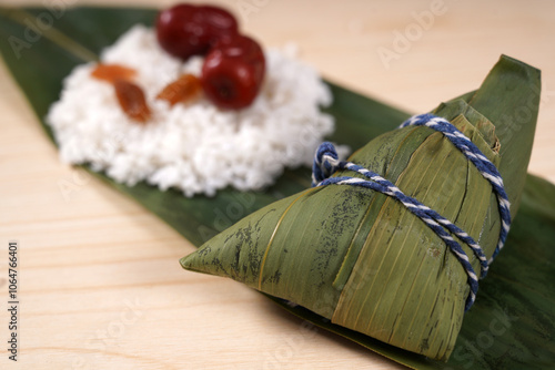 Rice dumplings, Glutinous Rice Wrapped in Bamboo Leaves photo