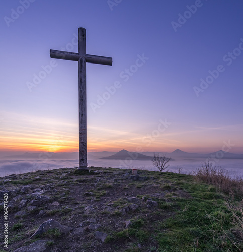 Hills in foggy evening. Radobyl hill in Czech Midland/ Ceske Stredohori, Czech republic