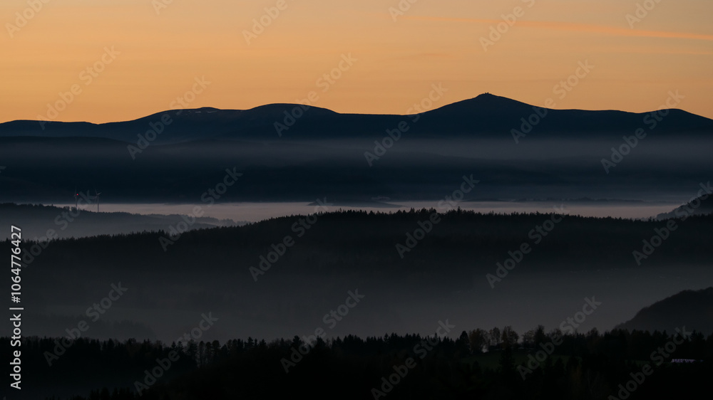Sunset in the Teplice-Adršpašské rocks. View of the Krkonoše Mountains from the Teplice-Adršpašské rocks. Sunset in the Teplice-Adršpašské rocks. View of the Krkonoše Mountains from the Teplice-Adršpašské rocks.