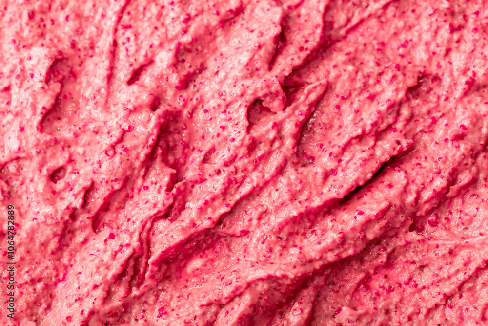 Obraz premium Fruit pink ice cream. Yogurt smoothie with fresh fruits and berries. Ice cream texture. Delicious sweet dessert close-up as background.