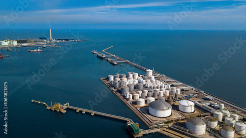 Aerial view oil and gas refinery depot industrial facility storage tank petrochemical, Crude oil and gas refinery depot terminal, Storage tank petroleum petrochemical oil and gas refinery oil and gas. photo